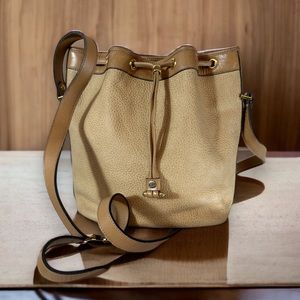 Christian Dior pebbled leather bucket bag adjustable strap cinch closure 090H